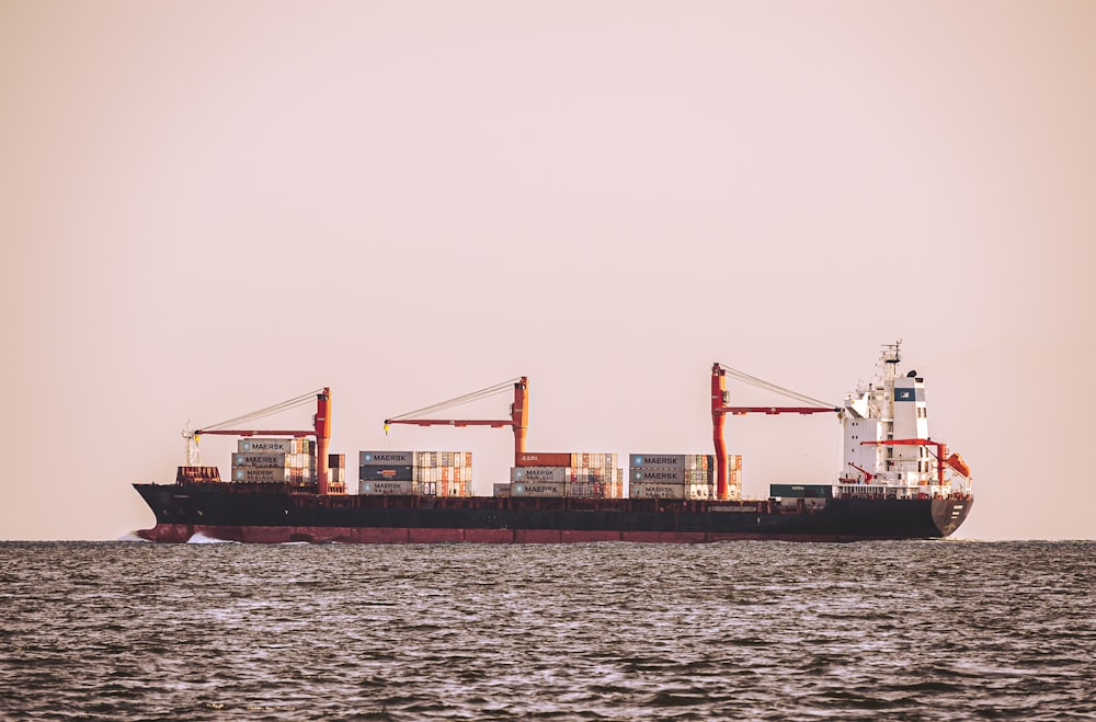 a large ship with cranes on it