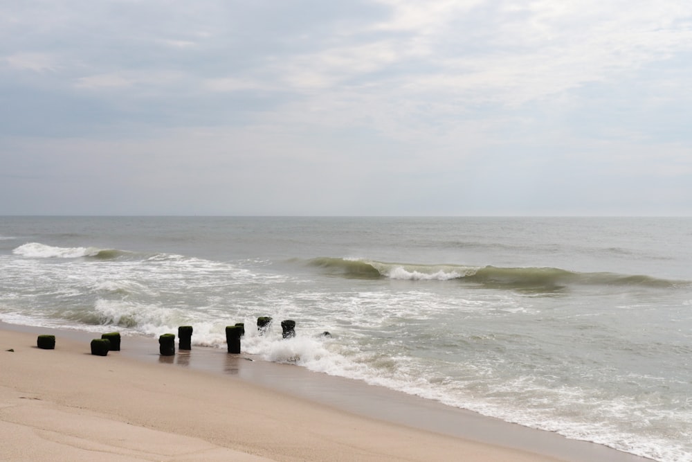 a beach with waves crashing