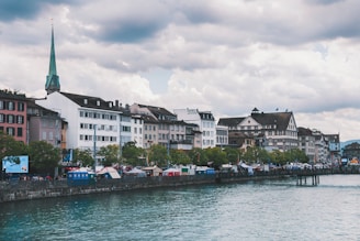a body of water with buildings along it