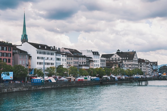 a body of water with buildings along it