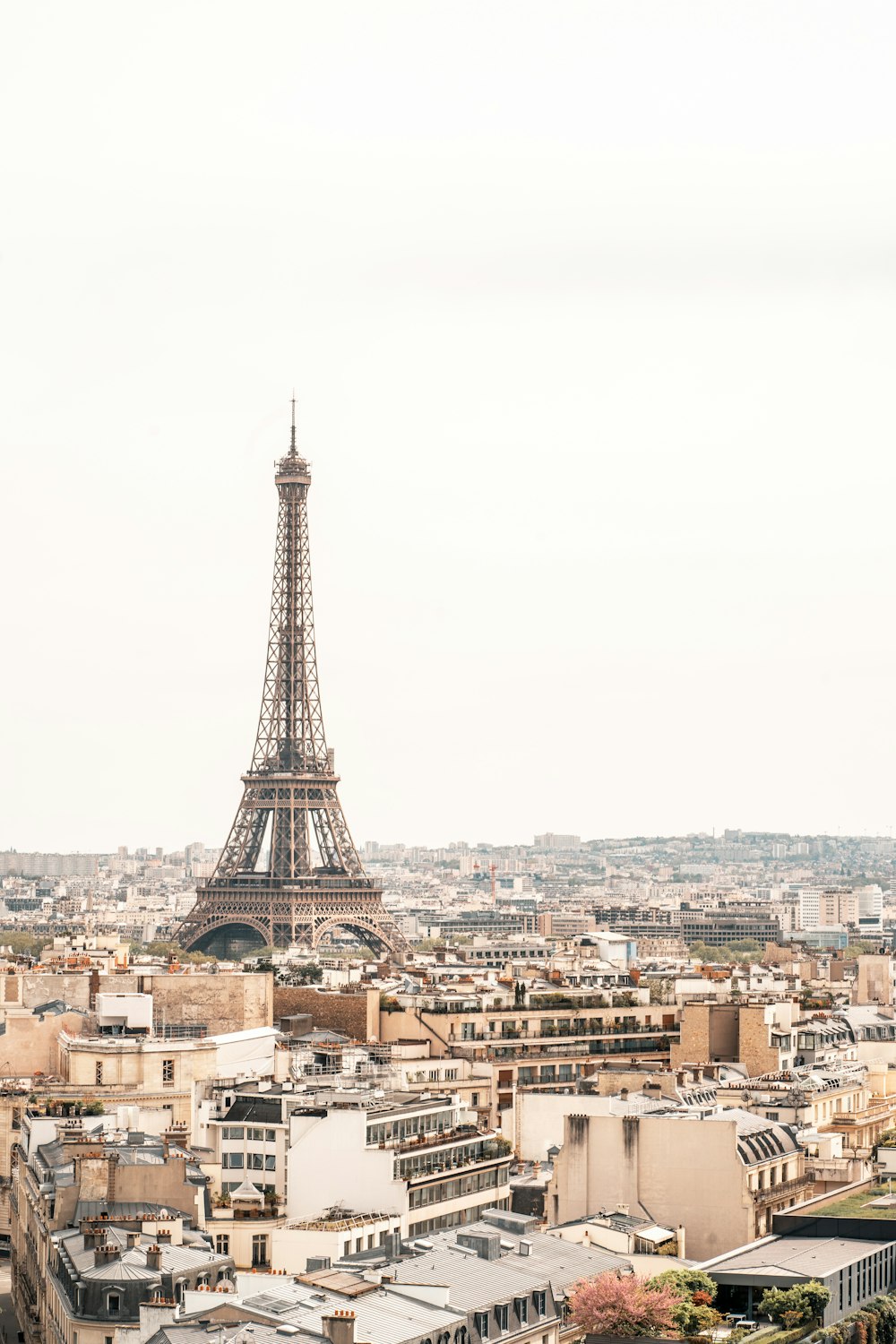 a tall metal tower in a city