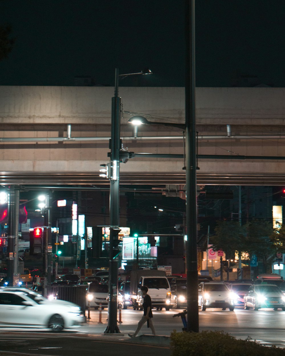 a person walking across a street