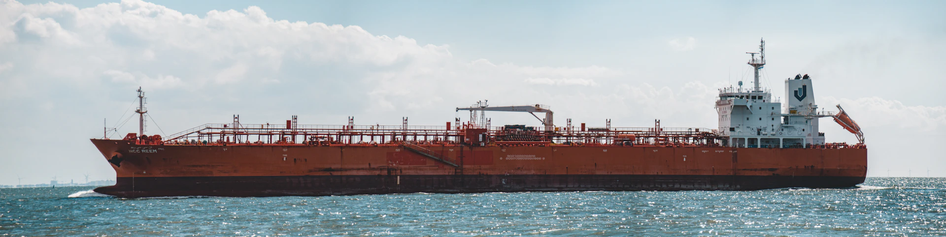 a large red and white ship