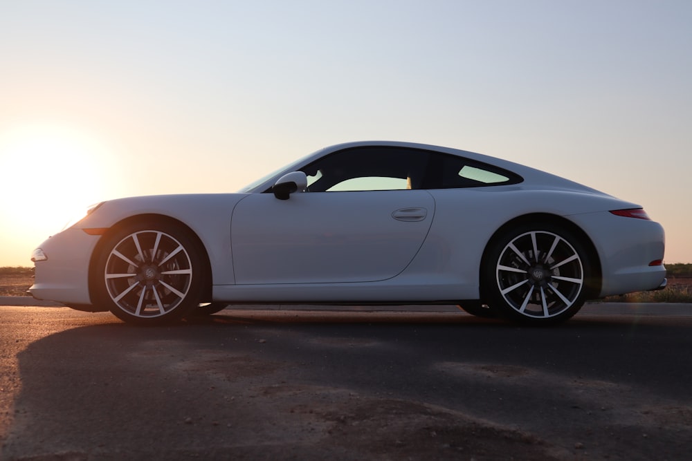 a white car parked on a road