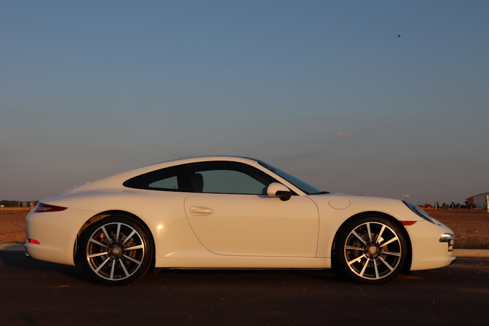 a white car parked on a road