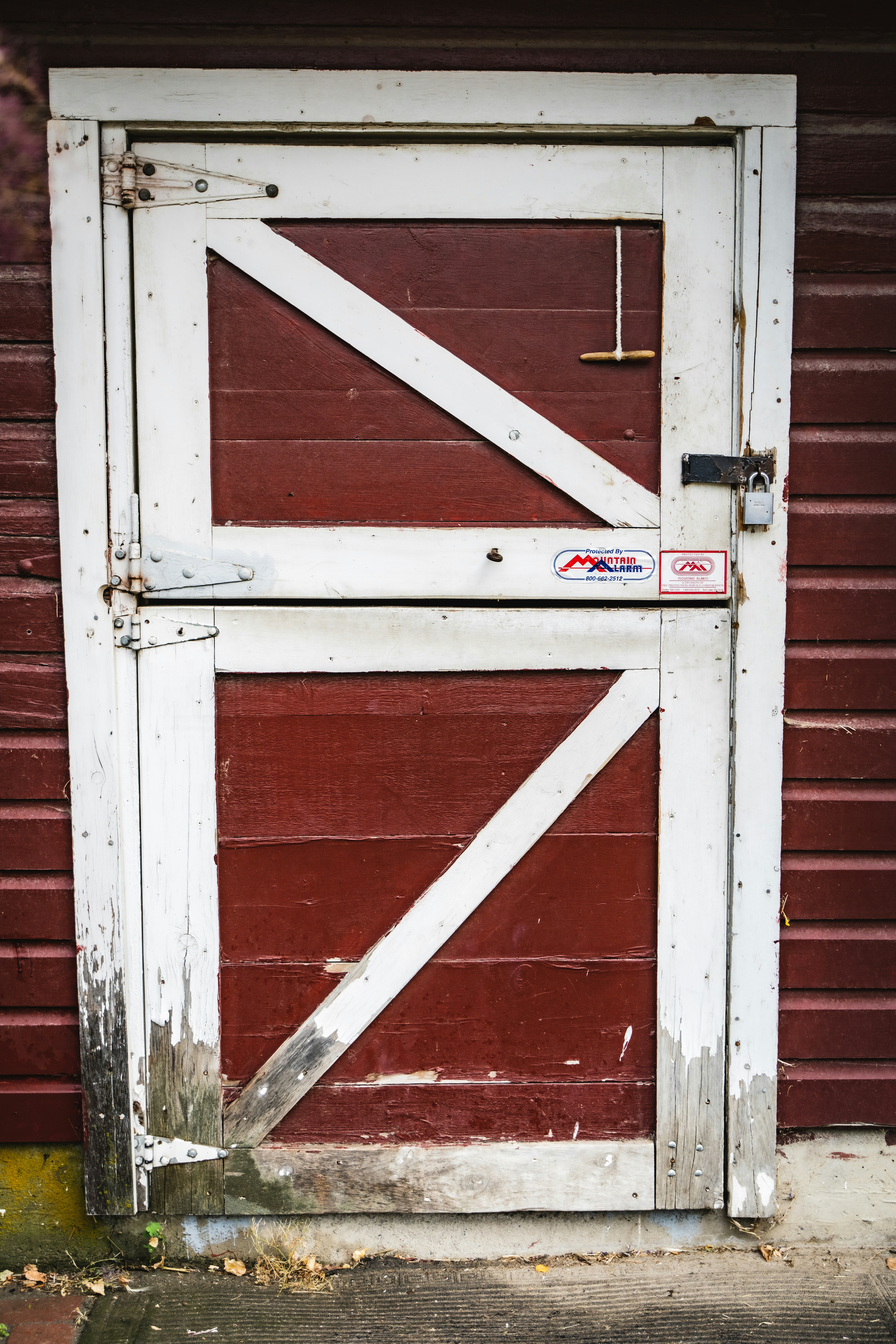 a white door with a red sign
