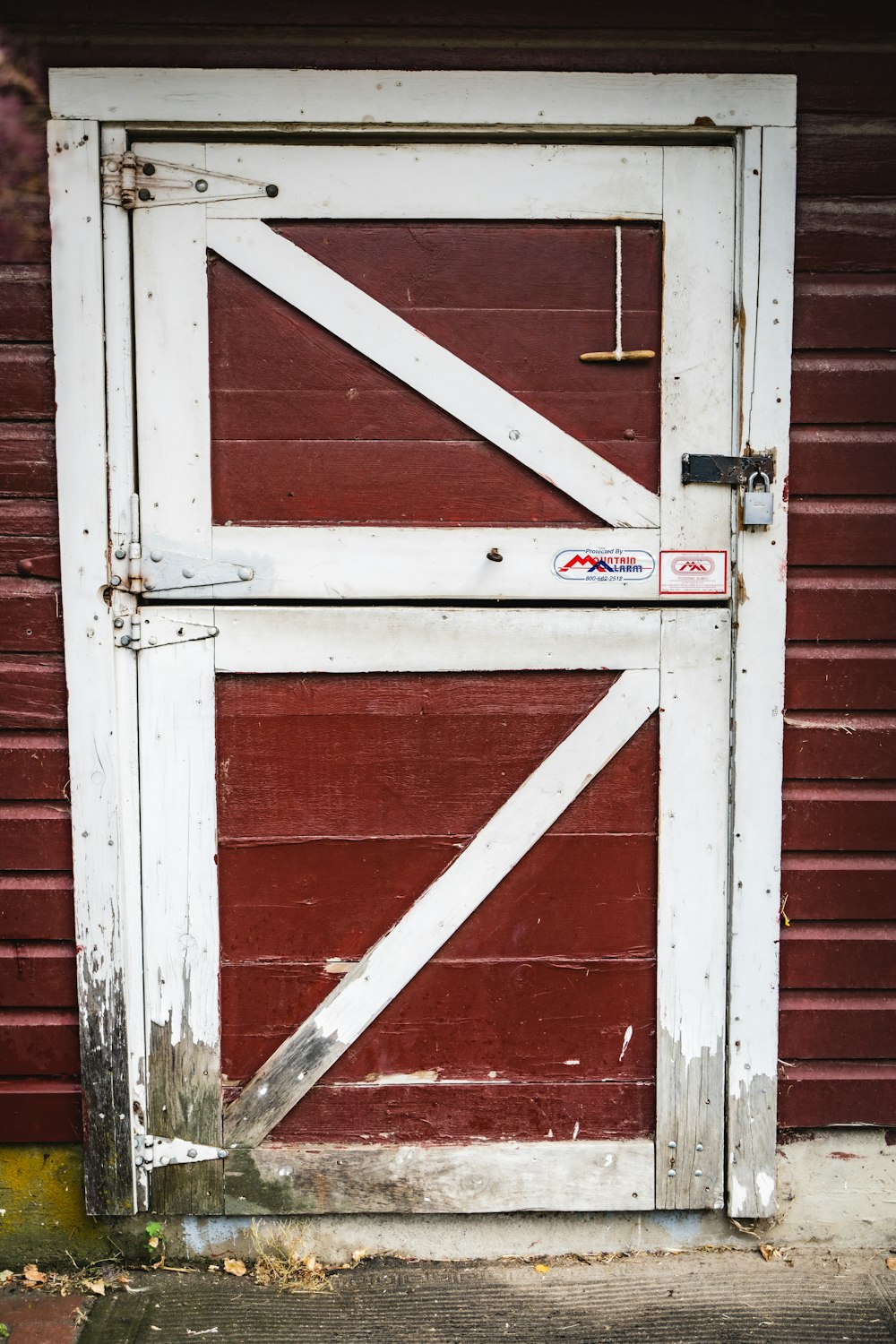 a white door with a red sign