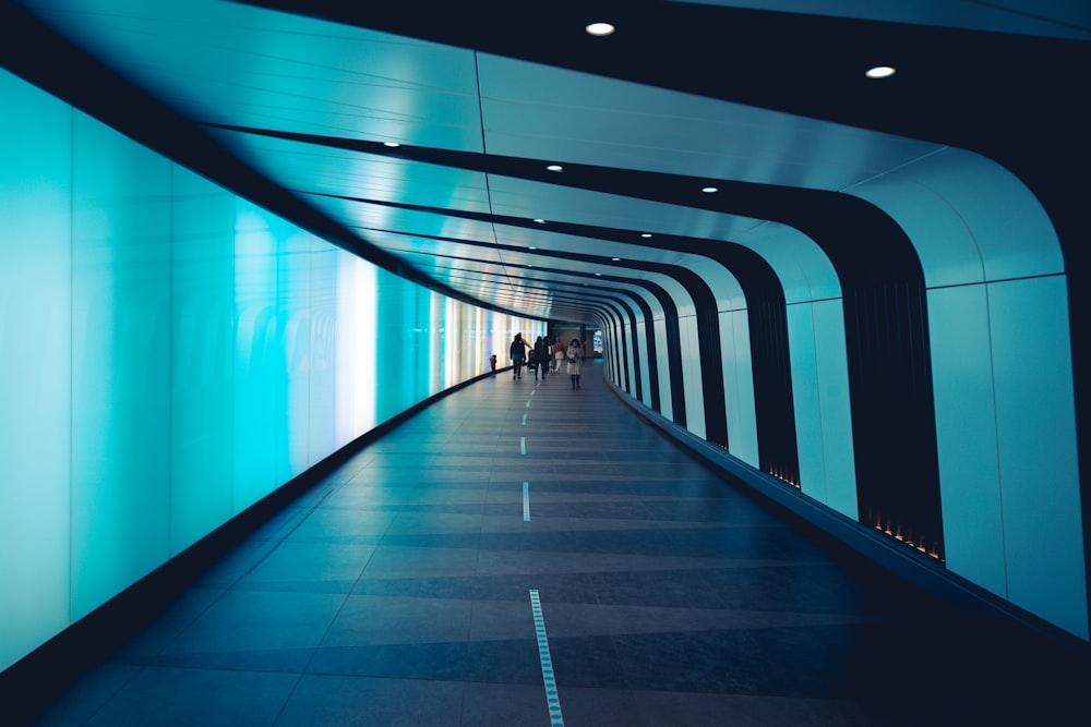 a long hallway with people