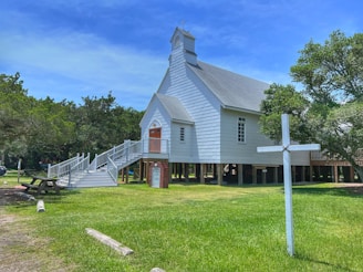 a white house with a steeple