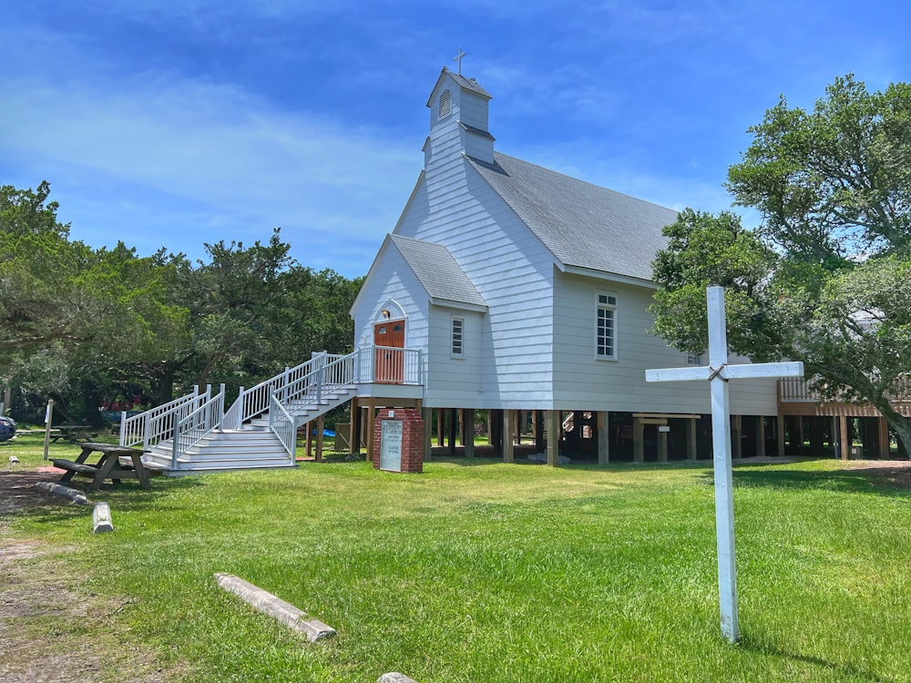 a white house with a steeple