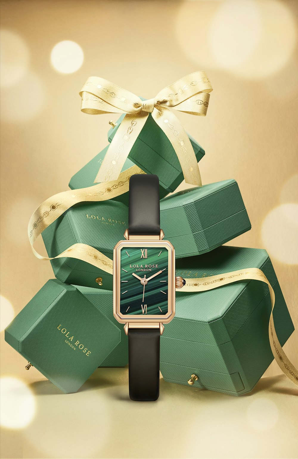 a watch on a green box