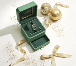 A neatly wrapped watch box showcasing secure and stylish packaging.