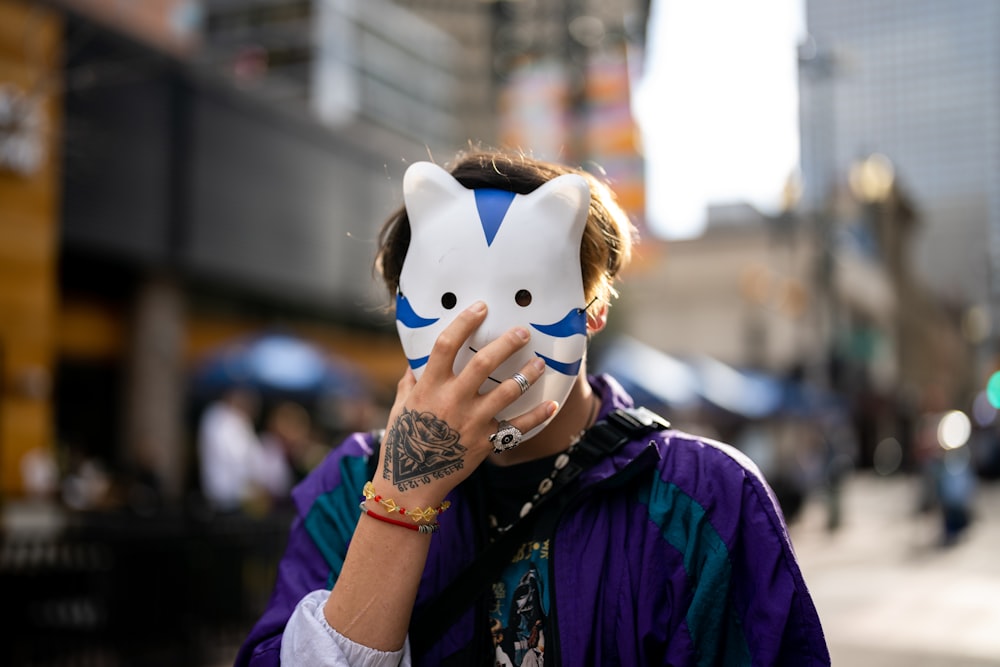 a person holding a stuffed animal