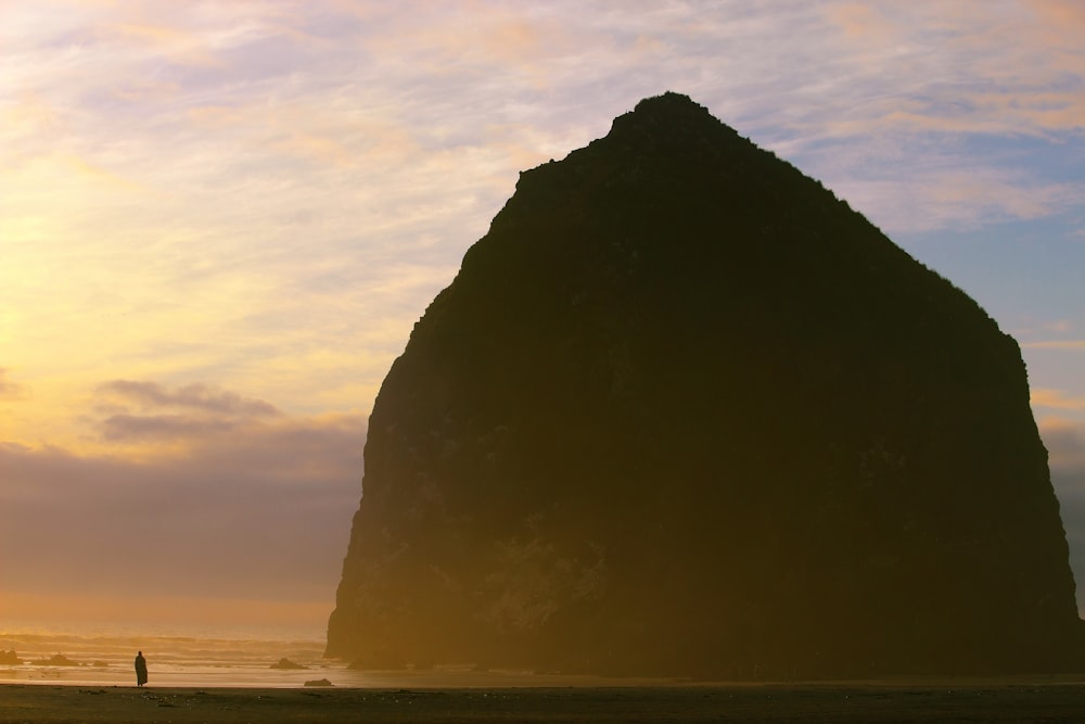 a large rock on a beach