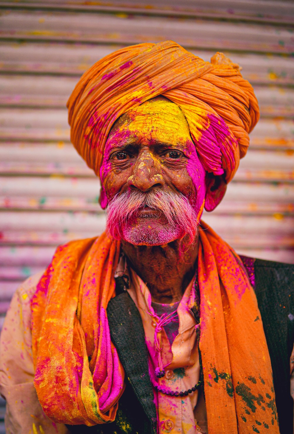 a person with colorful paint on the face