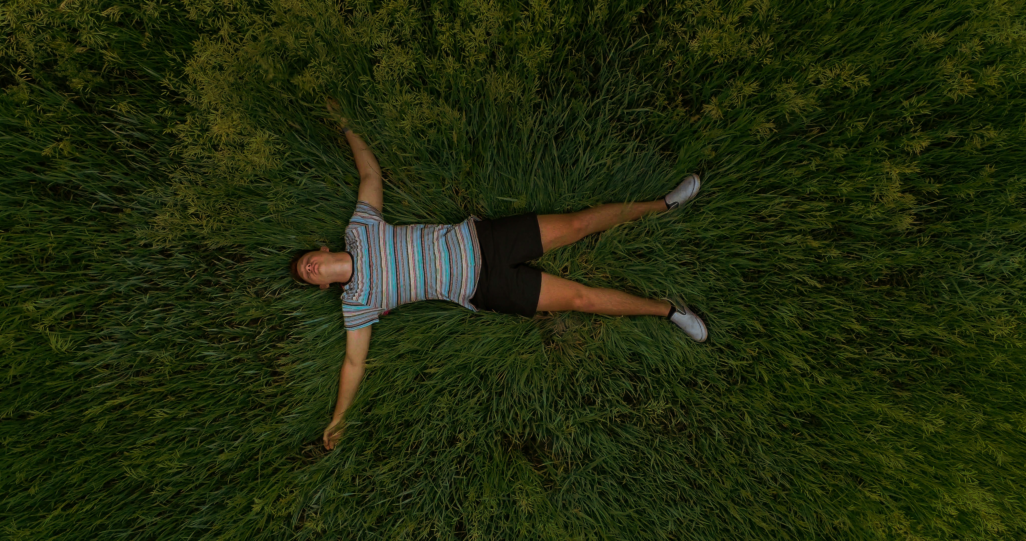 a person lying on the grass