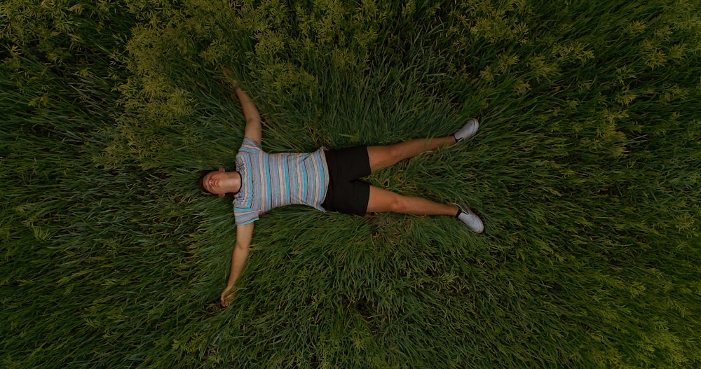 a person lying on the grass