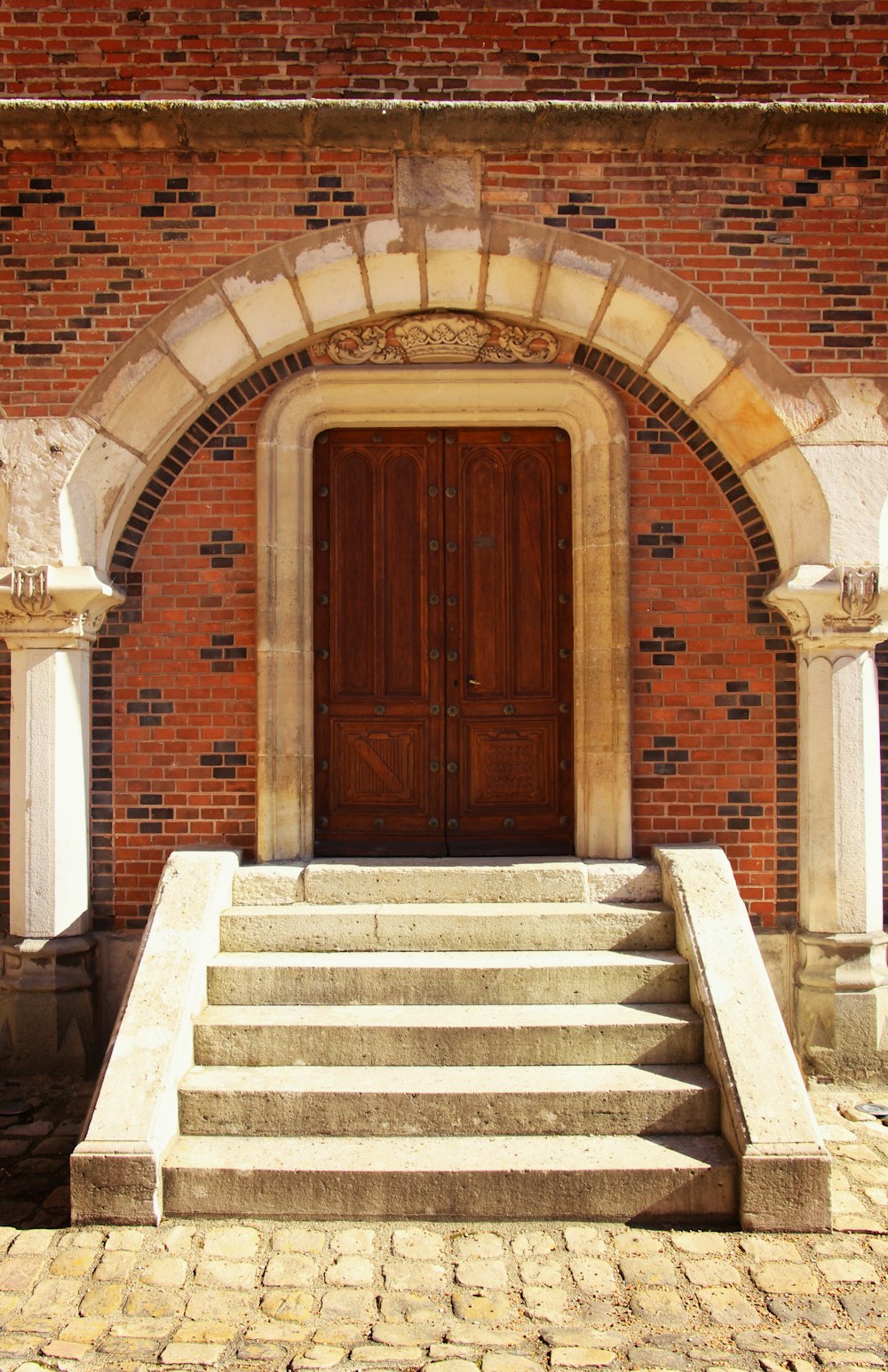 a brick building with a large door
