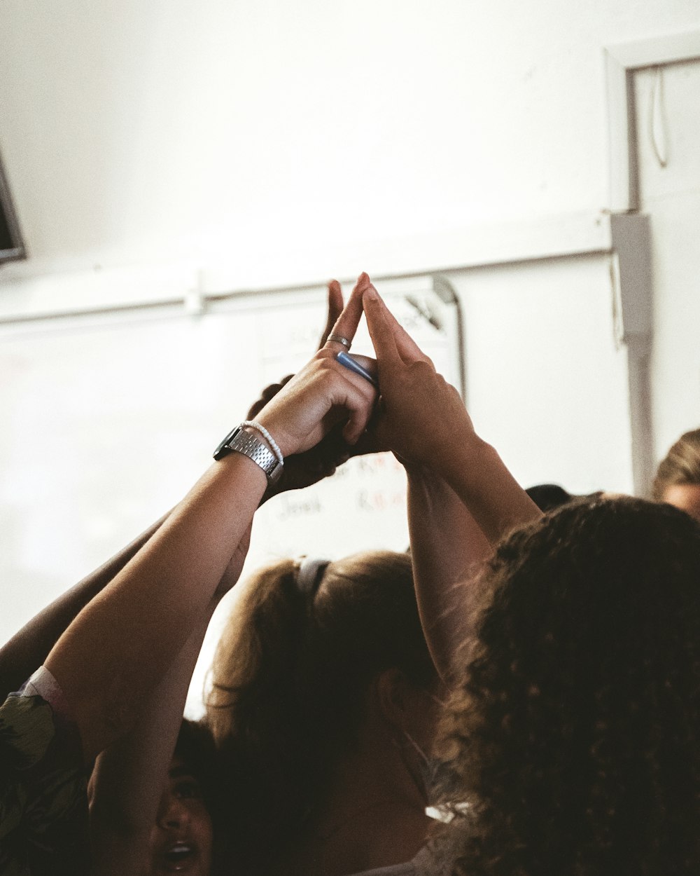 a person holding their hands up