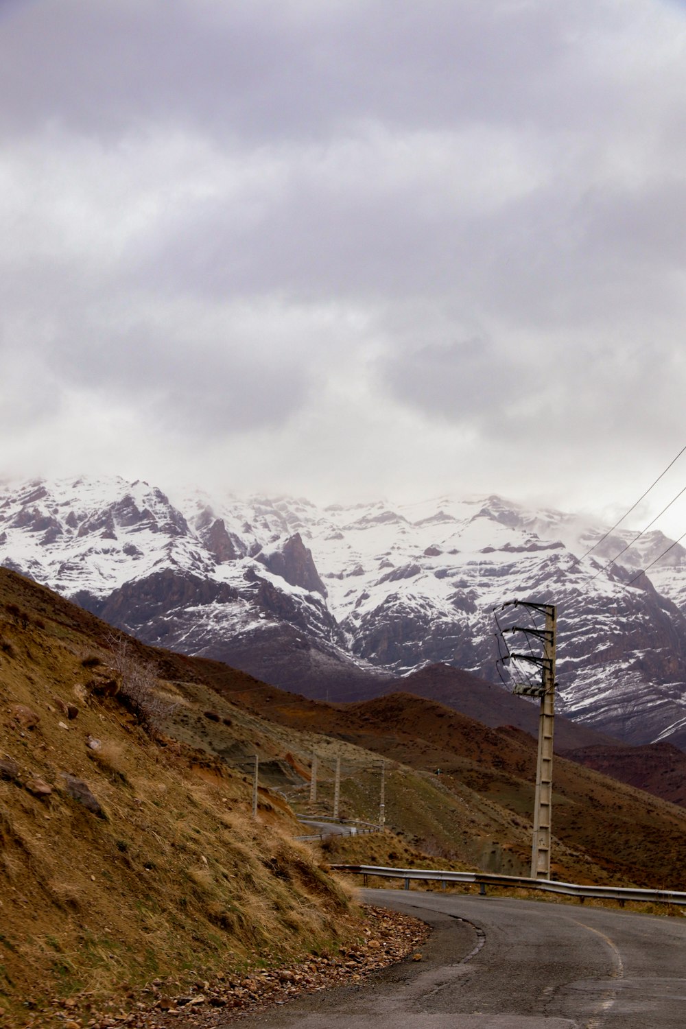 a road with snow on the side