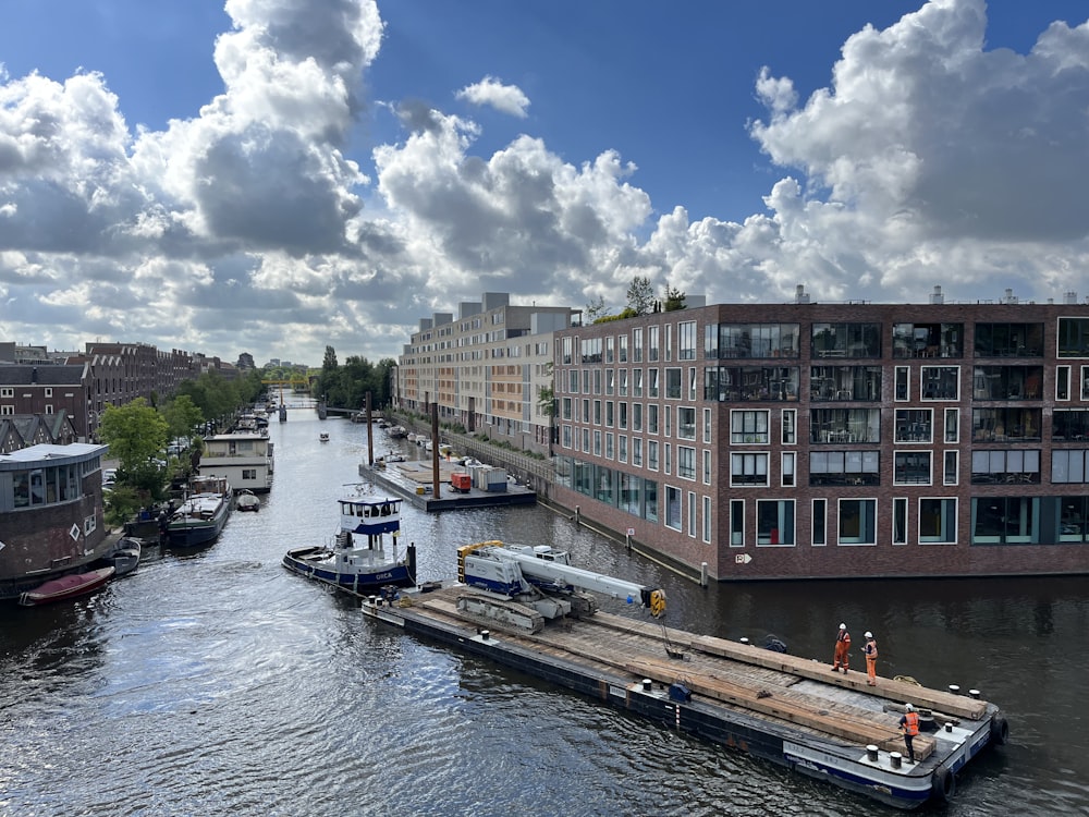 a body of water with boats and buildings around it