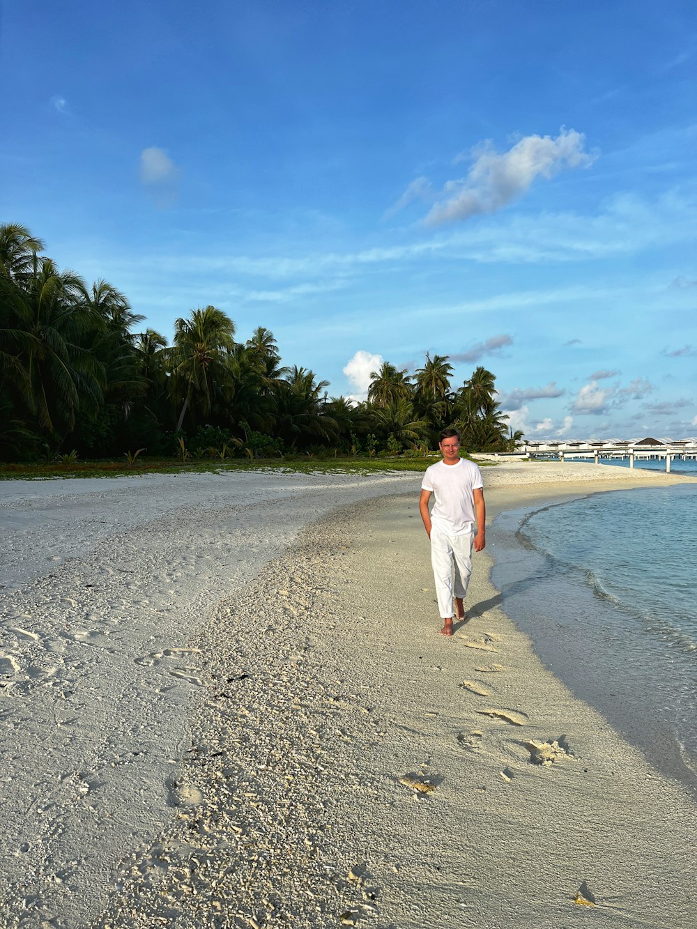 a man standing on a beach