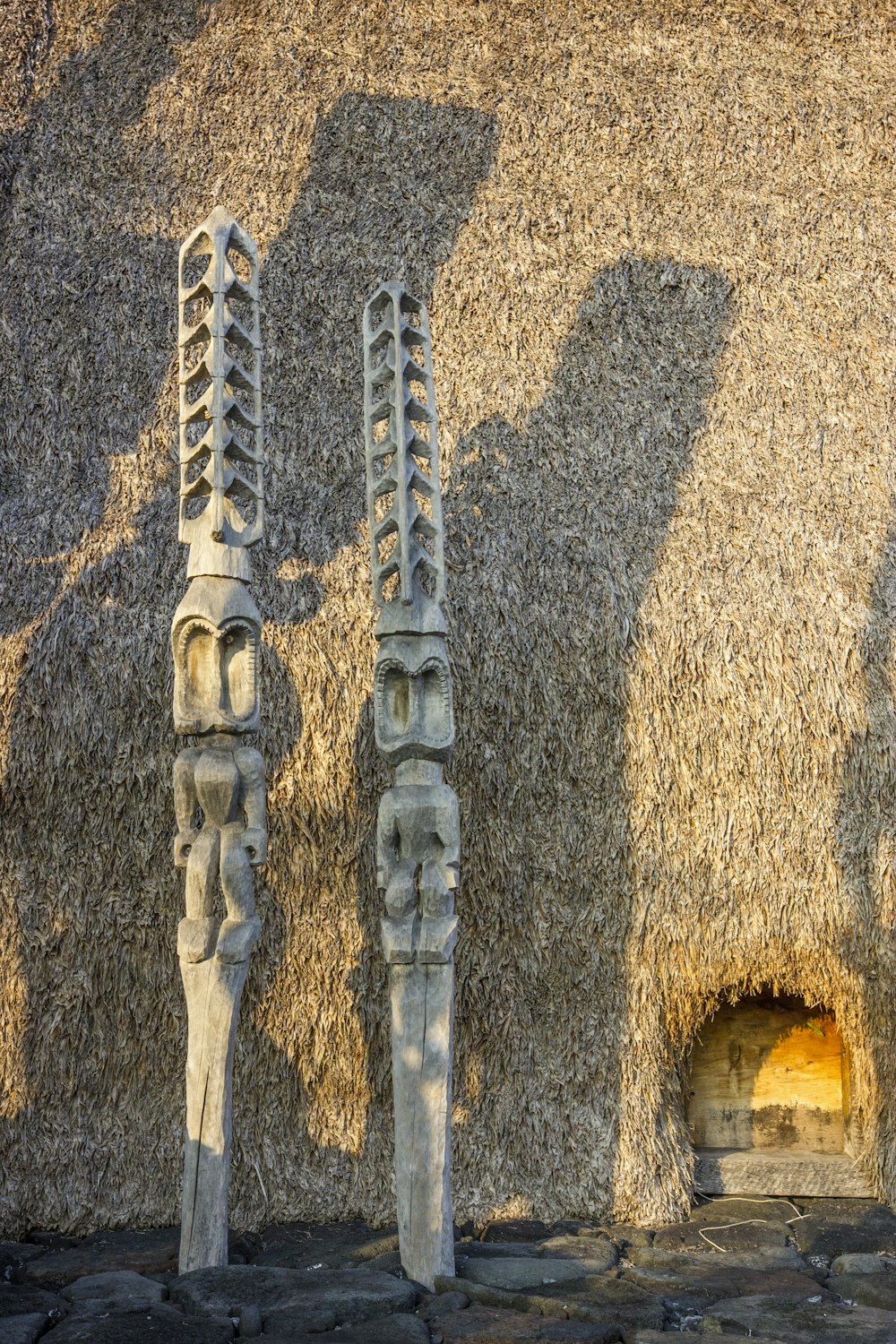 a stone wall with carvings