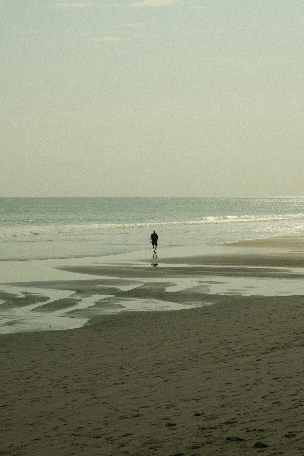 a person standing on a beach