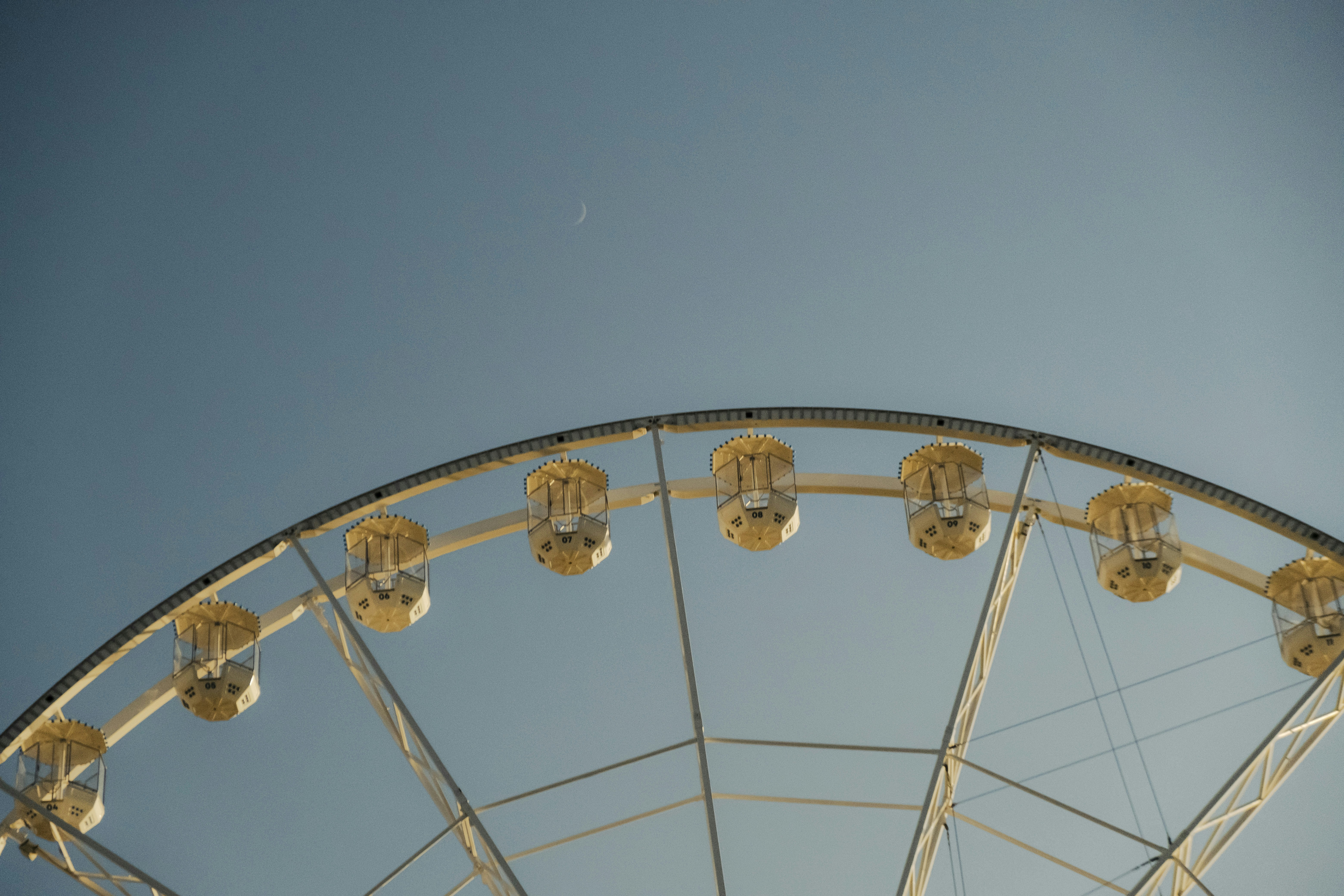 a ferris wheel with a blue sky