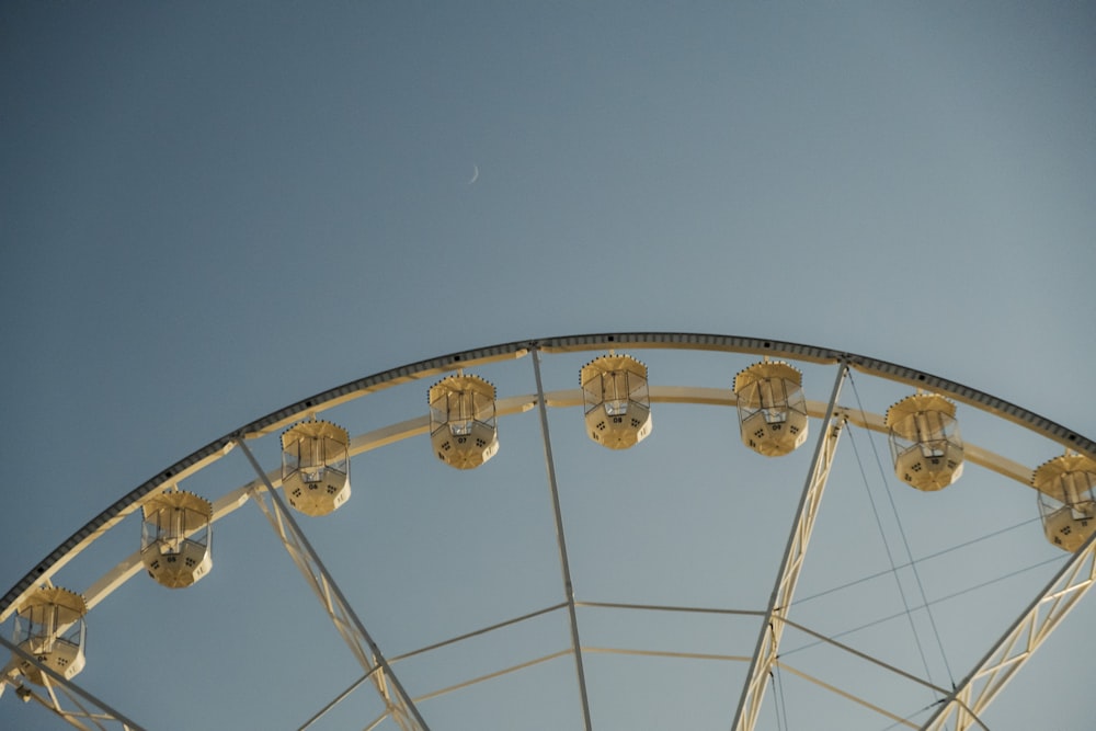 a ferris wheel with a blue sky