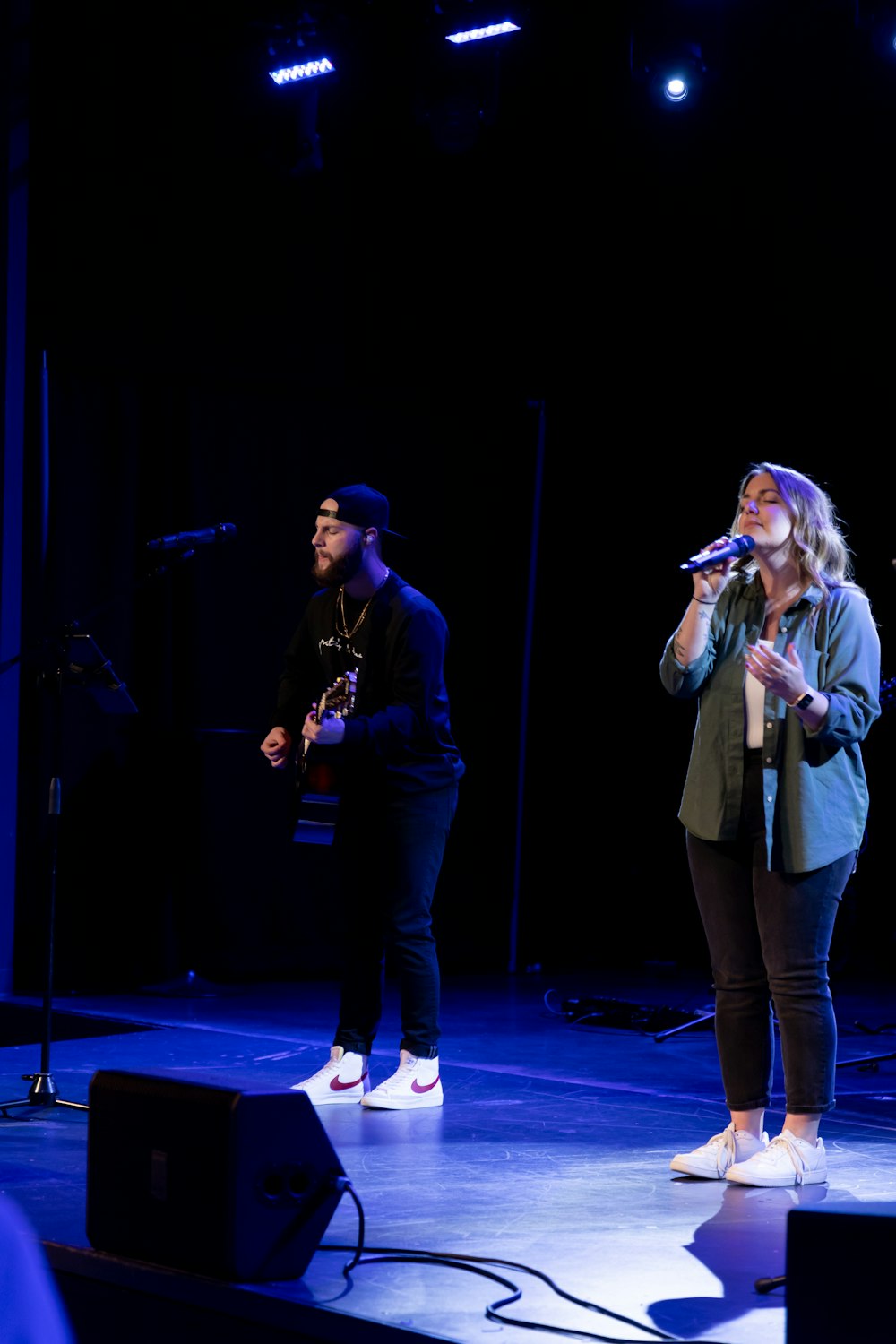 a man and woman on a stage