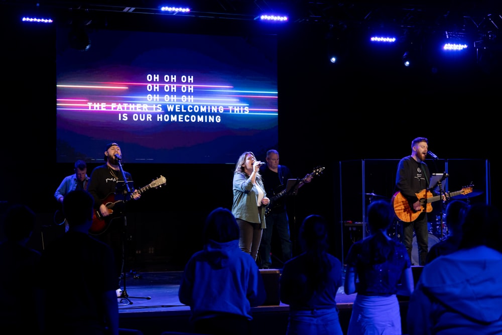 a group of people on a stage