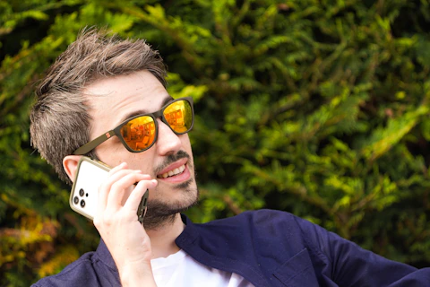 a man talking on a cell phone