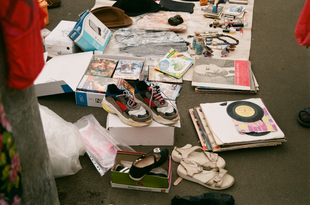 a table with books and shoes