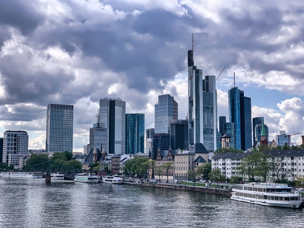 a city skyline with boats