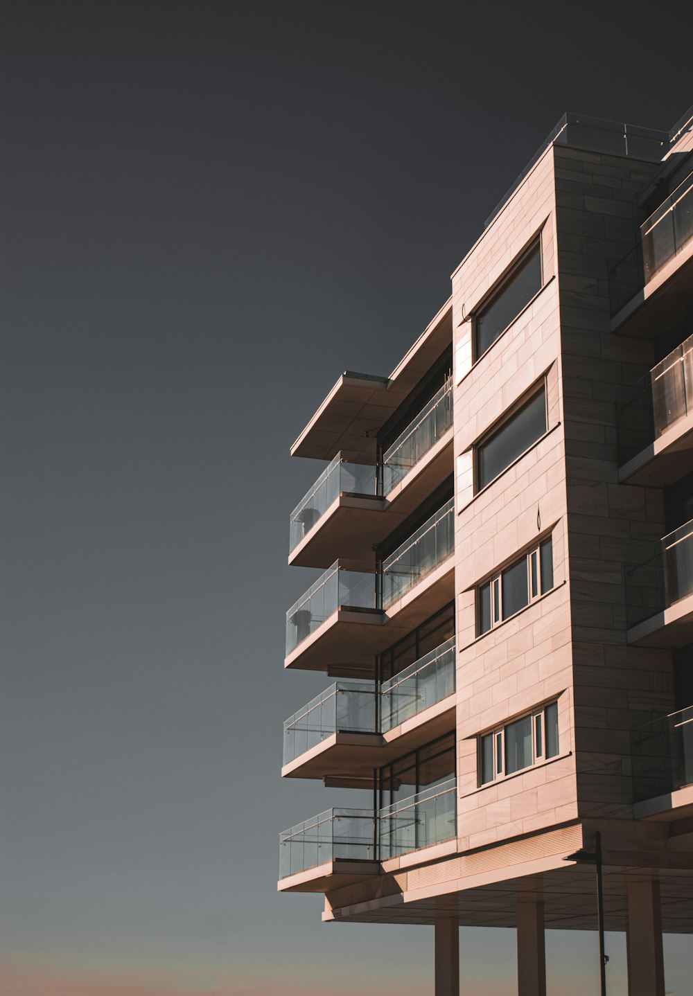 a tall building with balconies