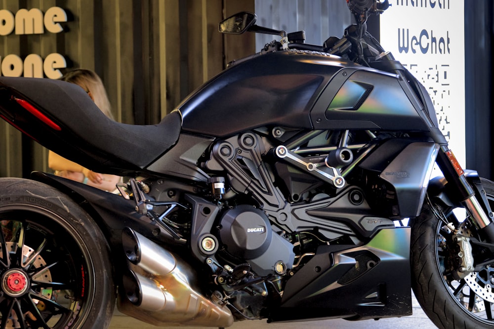 a black motorcycle on display