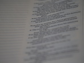 Close-up of a page featuring a faith-inspired poem with sophisticated serif typography.