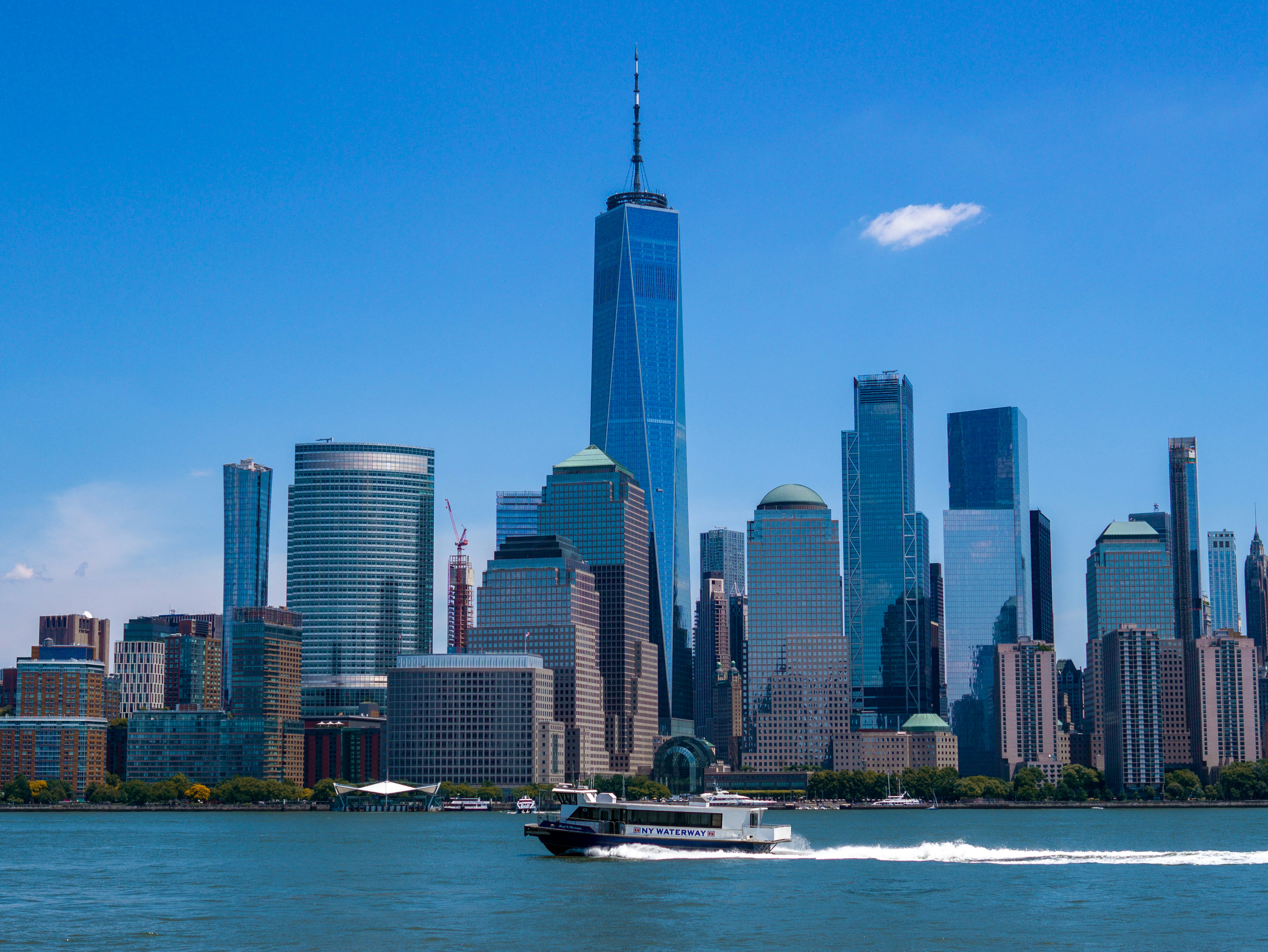 a city skyline with a boat