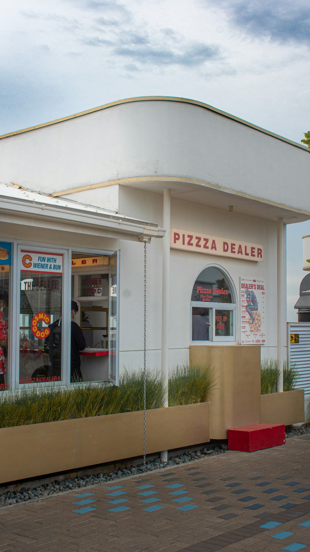 a store front with a person standing in the window