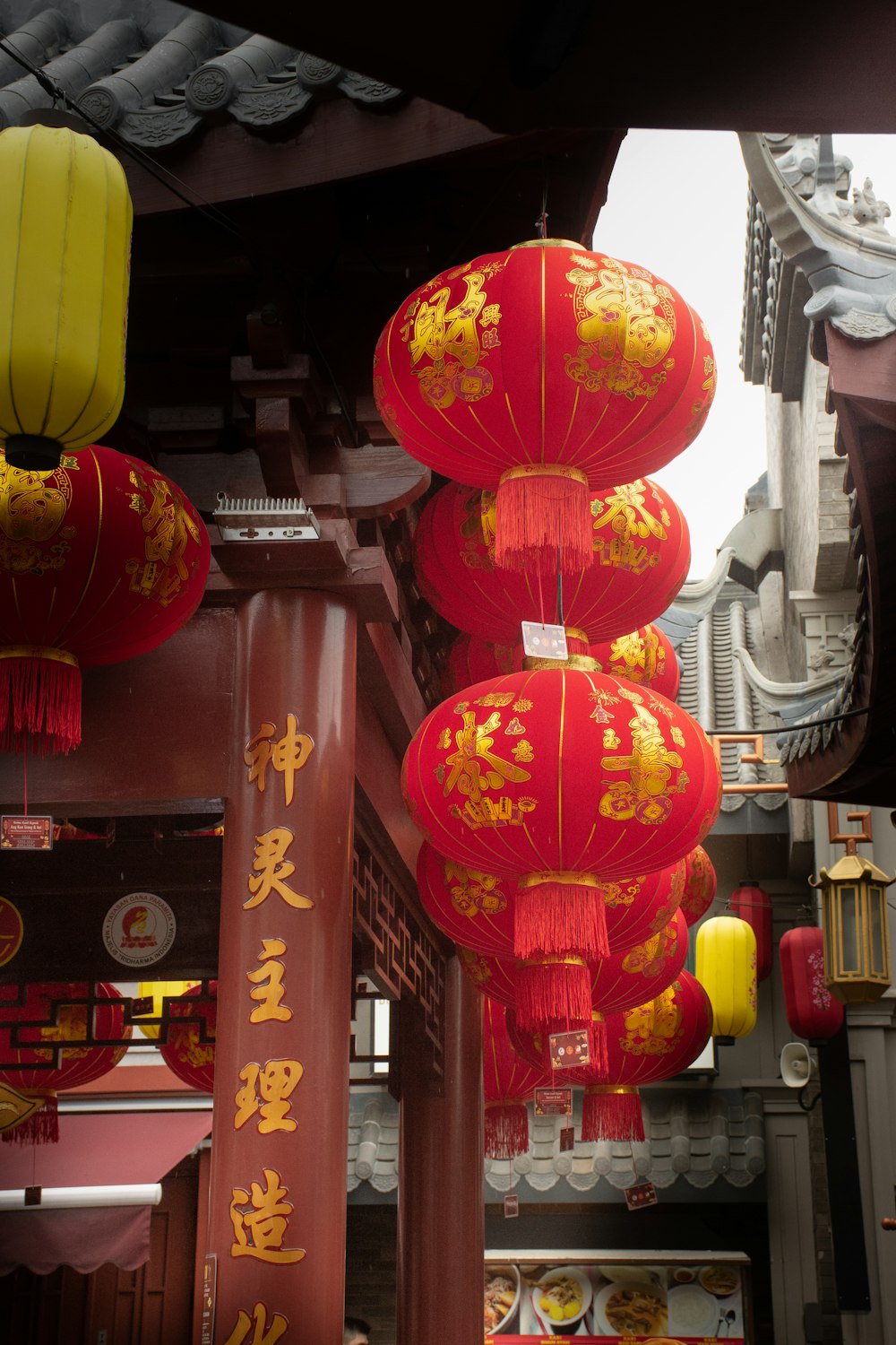 a group of lanterns from a ceiling