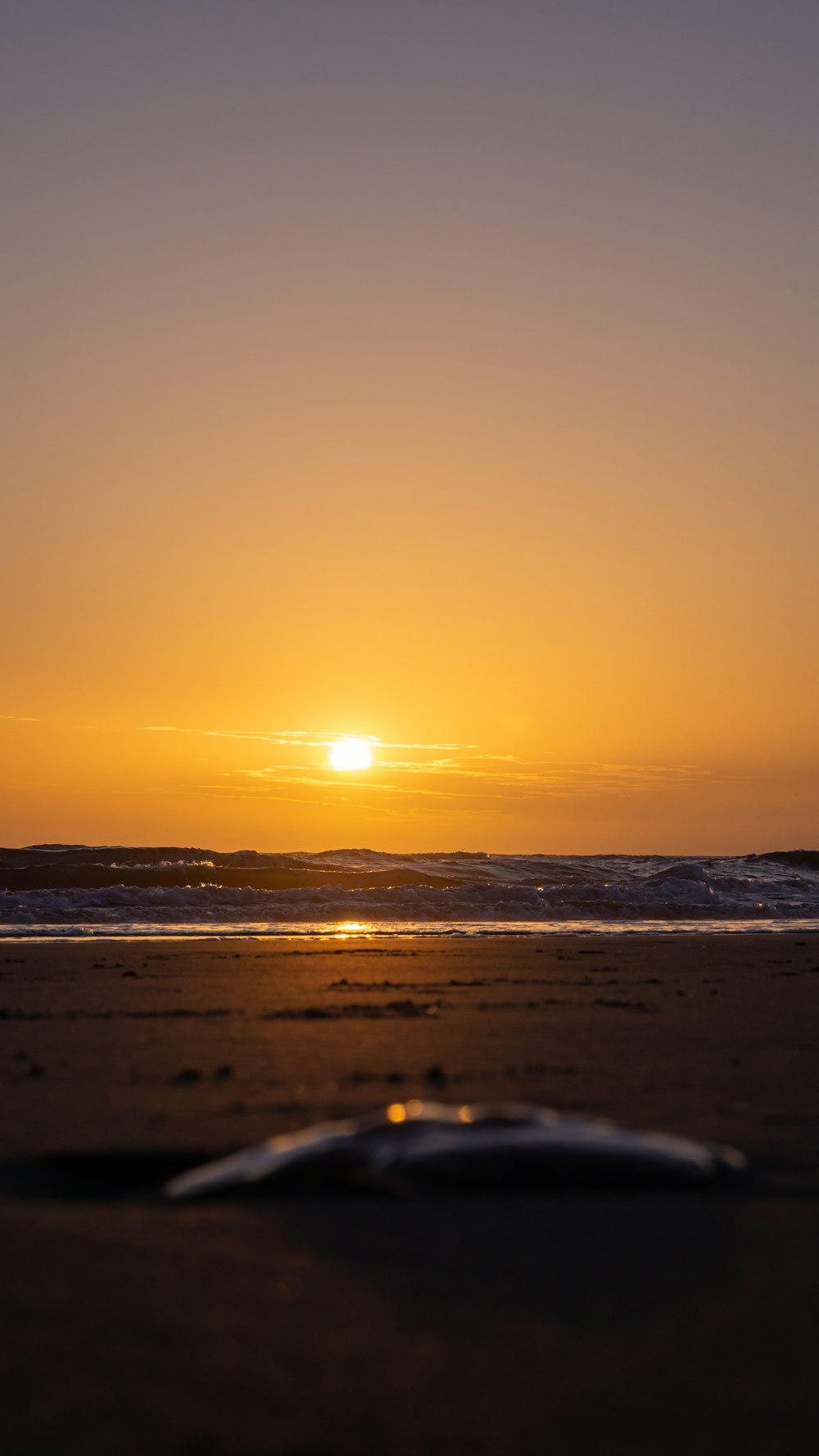 a sunset over a beach