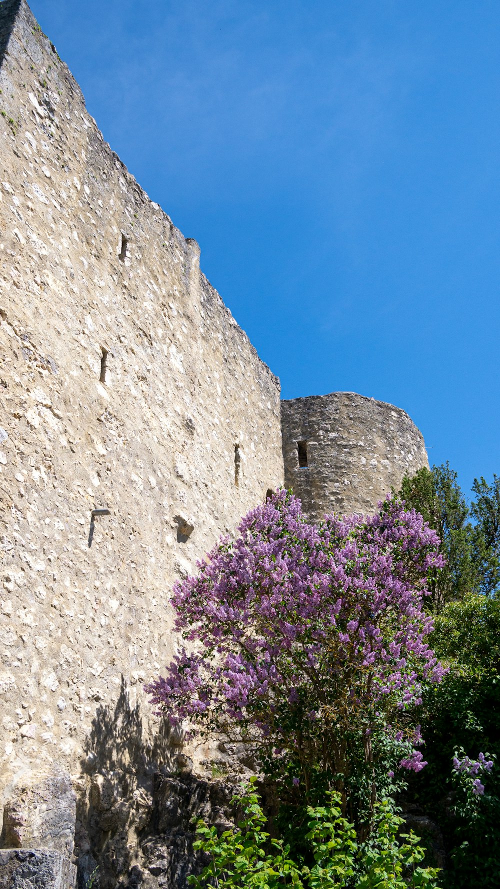 a stone building with a tower