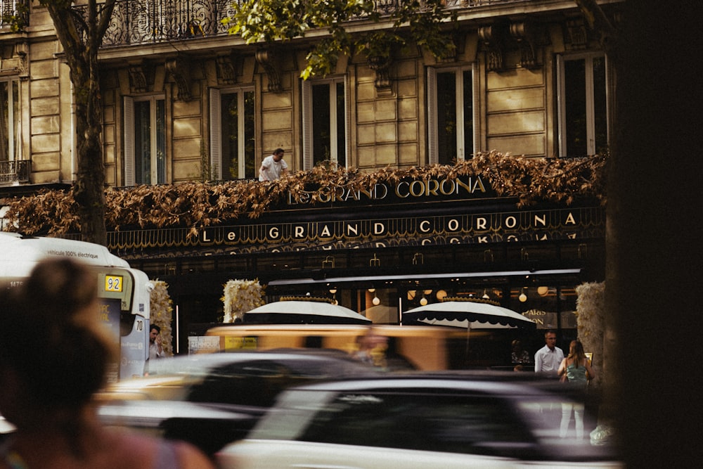 a street with cars and people