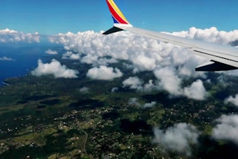 an airplane wing in the sky