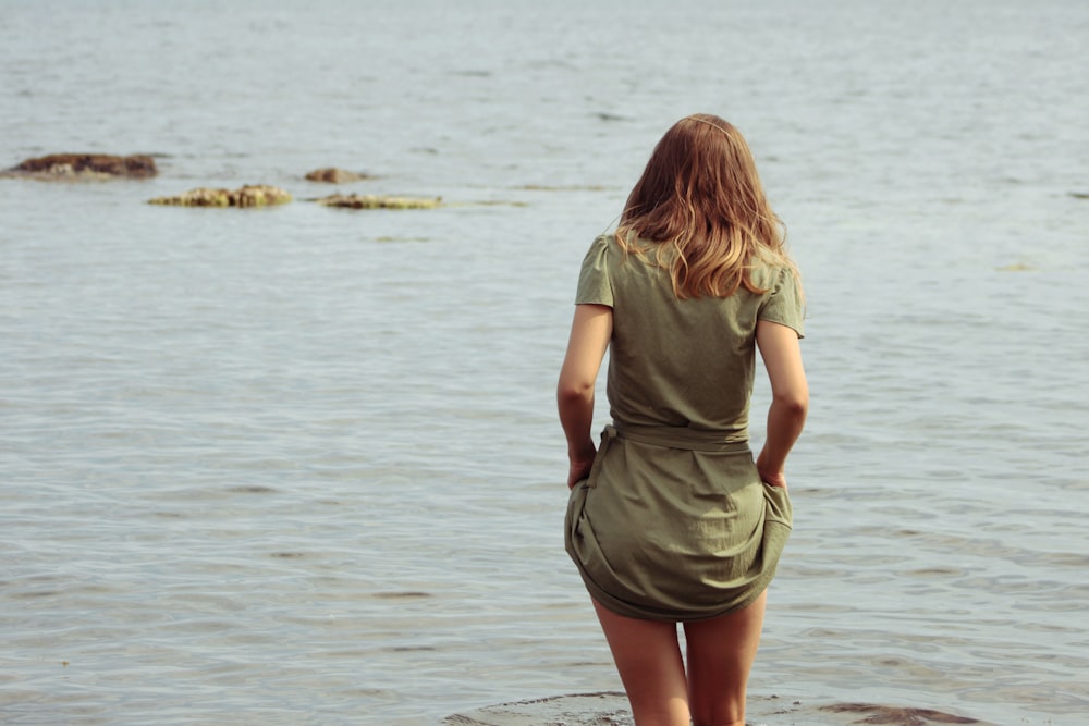 a woman walking in the water