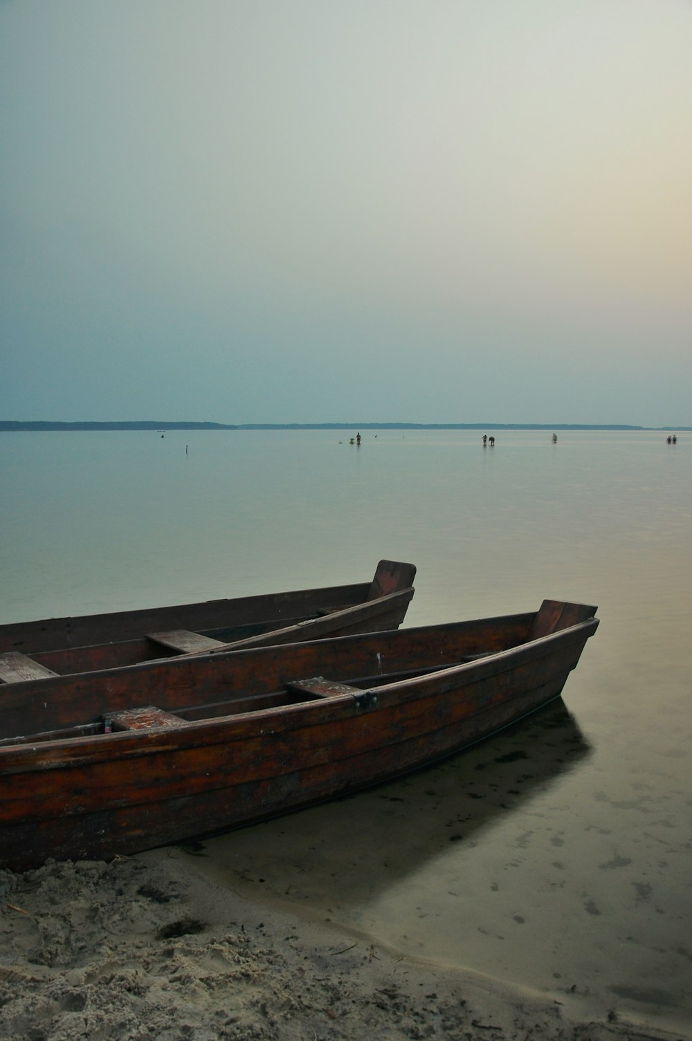 a couple of boats on a beach