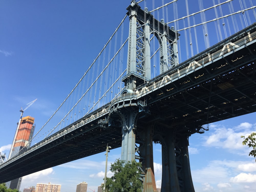 a large bridge with a blue sky