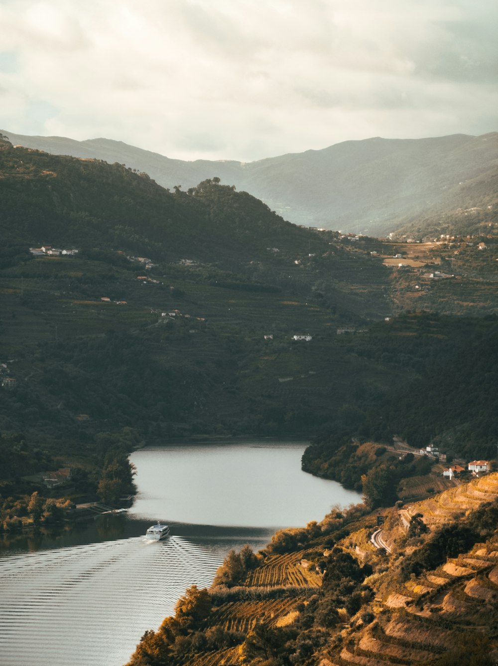 a lake surrounded by mountains