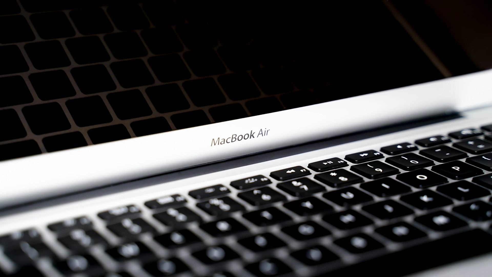 a keyboard with a white label